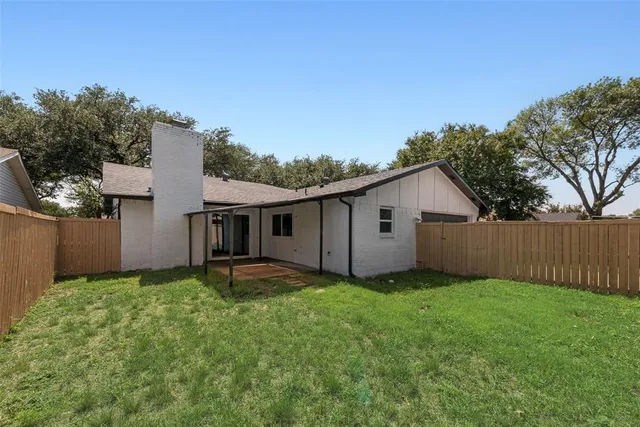 a view of a backyard of house