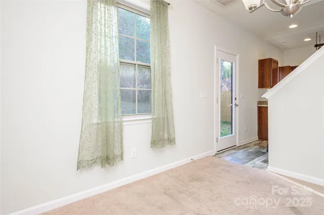 a view of livingroom with stainless steel appliances