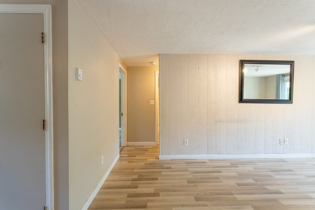 11 Tideview Path, Unit 17 Plymouth, MA 02360 - Photo 11 of 20 a view of a room with wooden floor and staircase