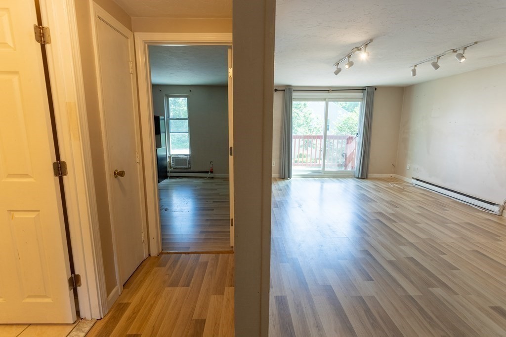 11 Tideview Path, Unit 17 Plymouth, MA 02360 - Photo 12 of 20 a view of hallway with wooden floor