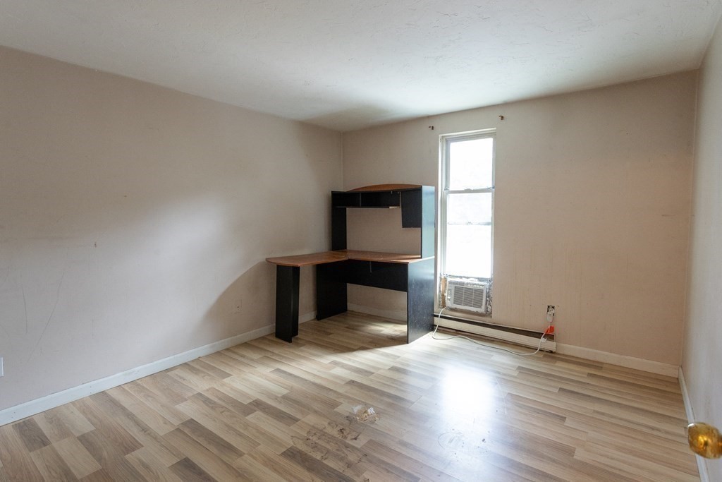 11 Tideview Path, Unit 17 Plymouth, MA 02360 - Photo 14 of 20 a view of a room with wooden floor and cabinet