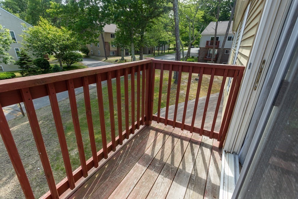 11 Tideview Path, Unit 17 Plymouth, MA 02360 - Photo 9 of 20 a view of balcony with wooden floor