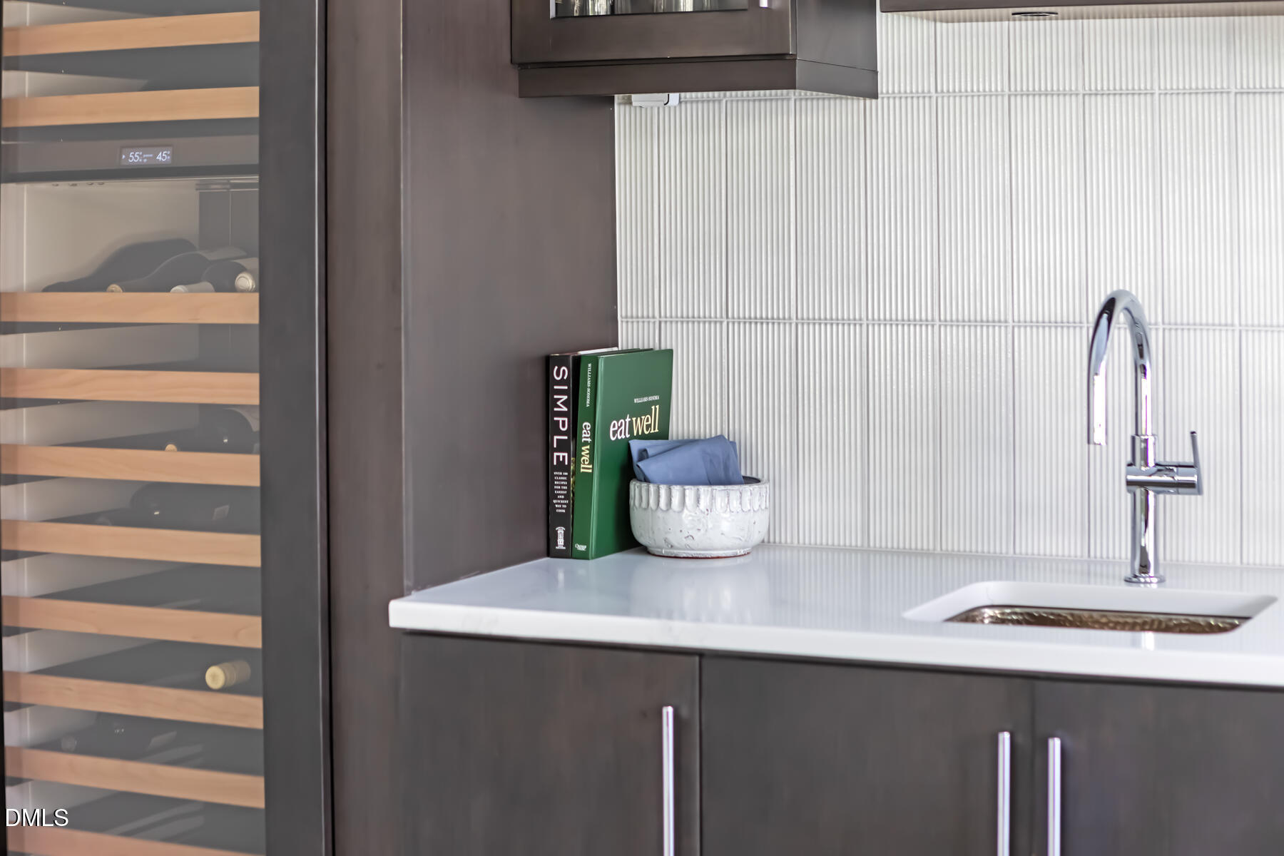 4300 Camelot Drive Raleigh, NC 27609 - Photo 24 of 71 a bathroom with a sink and a mirror