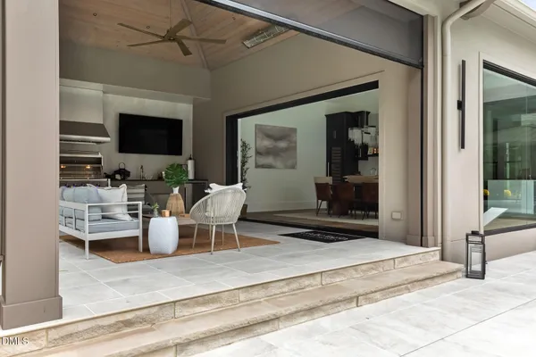 a utility room with cabinets washer and dryer