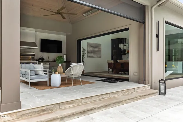 a utility room with cabinets washer and dryer