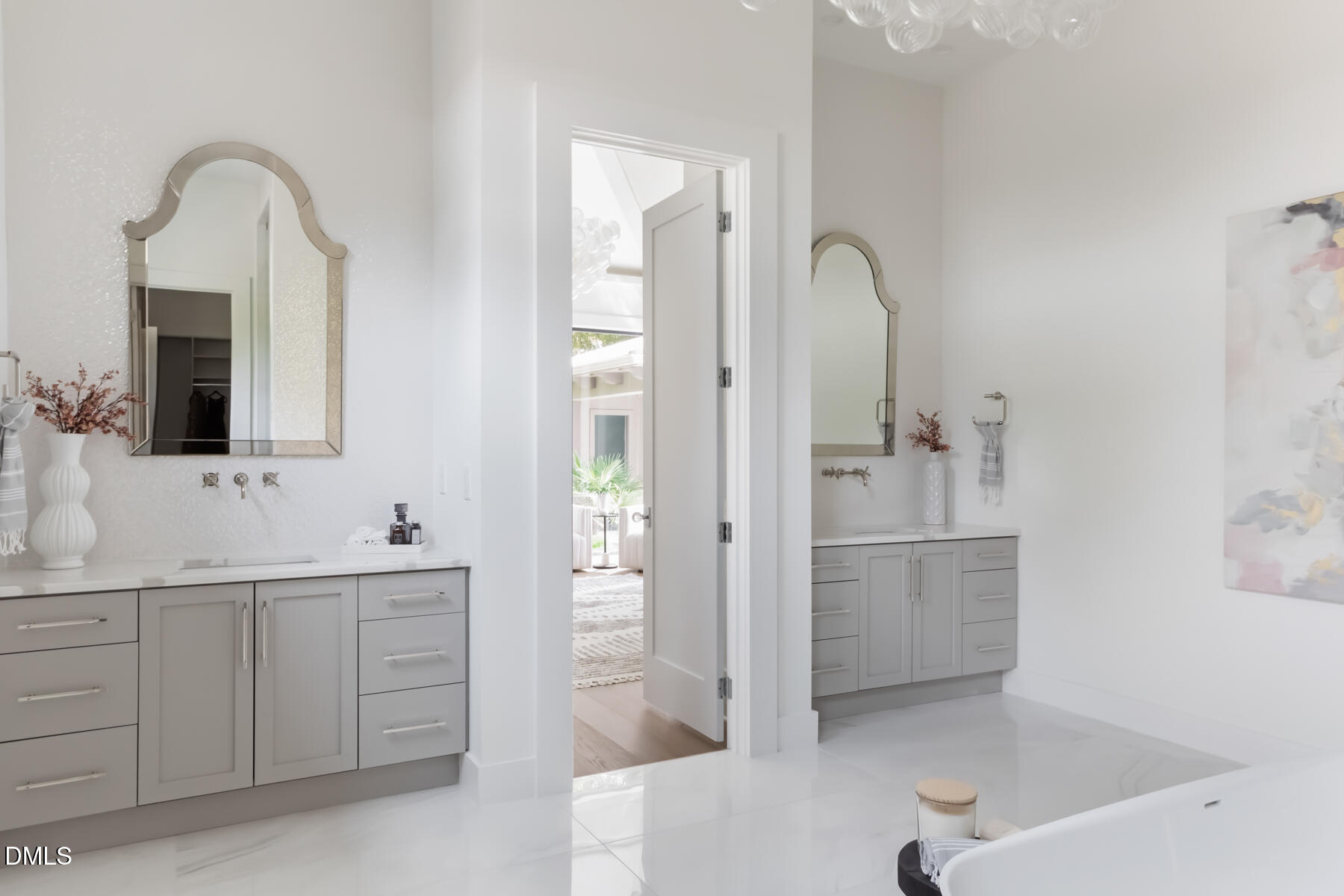 4300 Camelot Drive Raleigh, NC 27609 - Photo 43 of 71 a bathroom with a double vanity sink mirror and