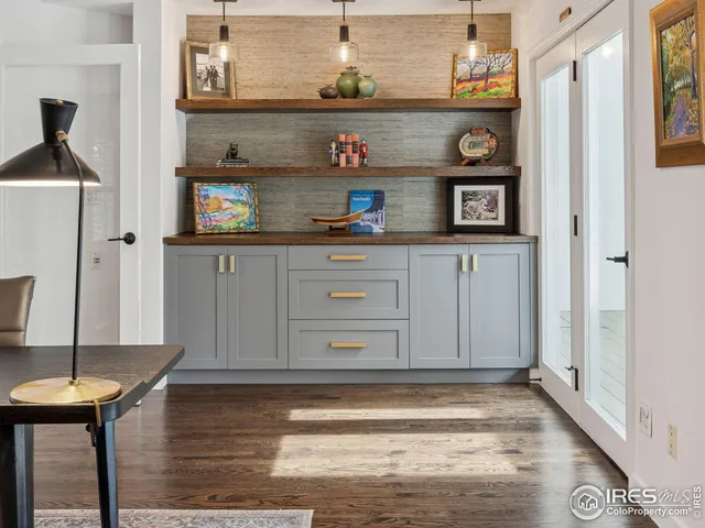 a balcony with wooden floor