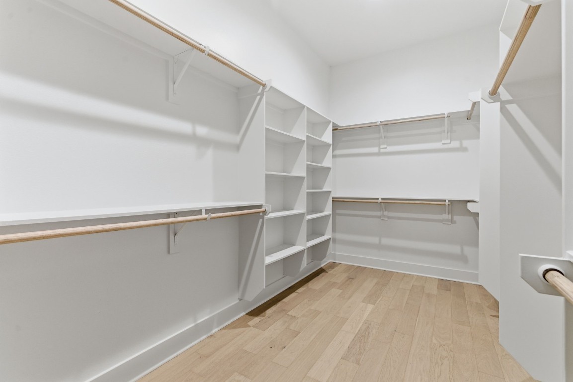 1005 Walton Street Houston, TX 77009 - Photo 19 of 36 The primary closet is oversized and has plenty of room.