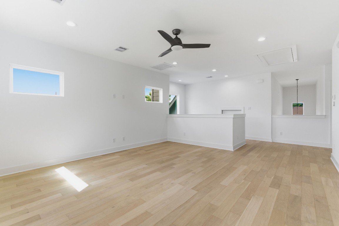 1005 Walton Street Houston, TX 77009 - Photo 23 of 36 Oversized game room upstairs is perfect for anything you need. Hardwood floors continue upstairs as well.