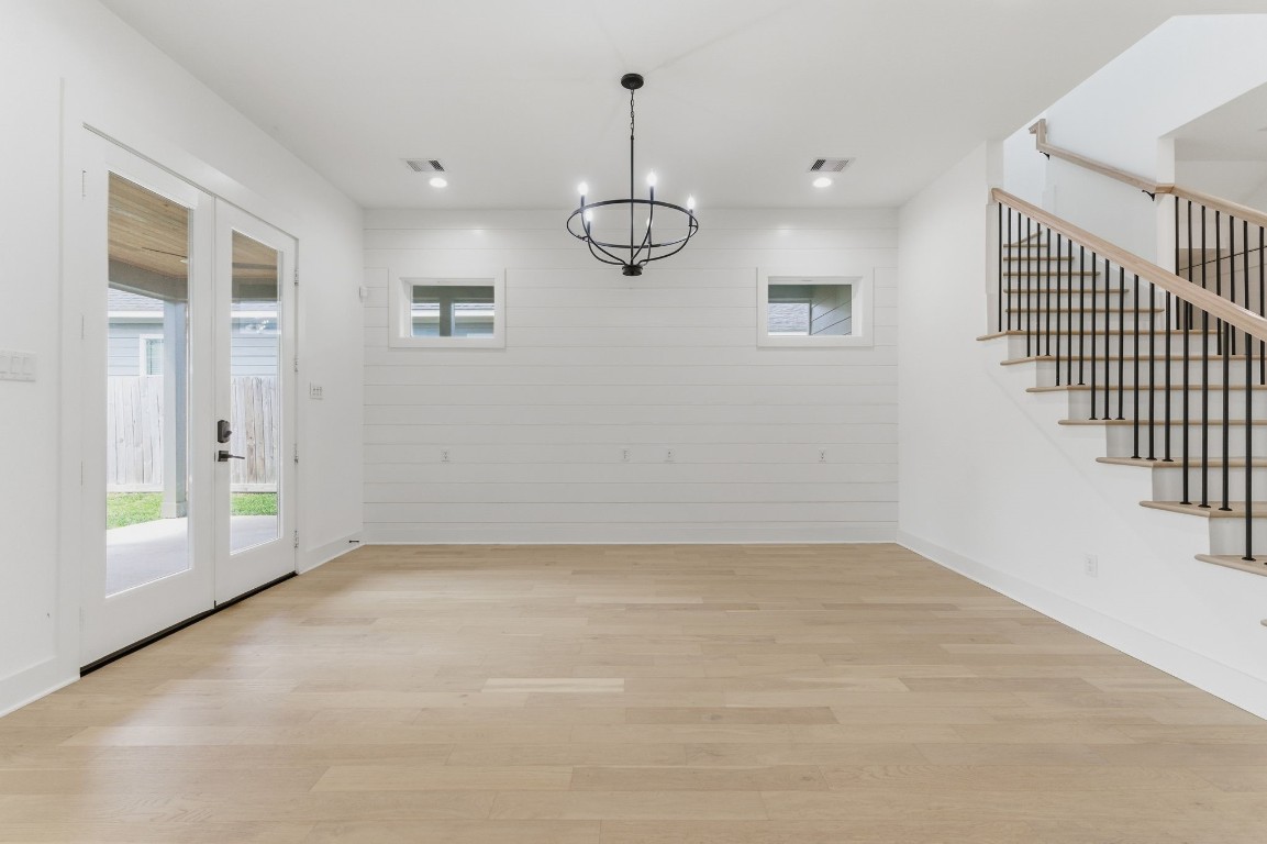 1005 Walton Street Houston, TX 77009 - Photo 8 of 36 The Dining Room is open to the kitchen and has French Doors leading you to the covered patio and private backyard.