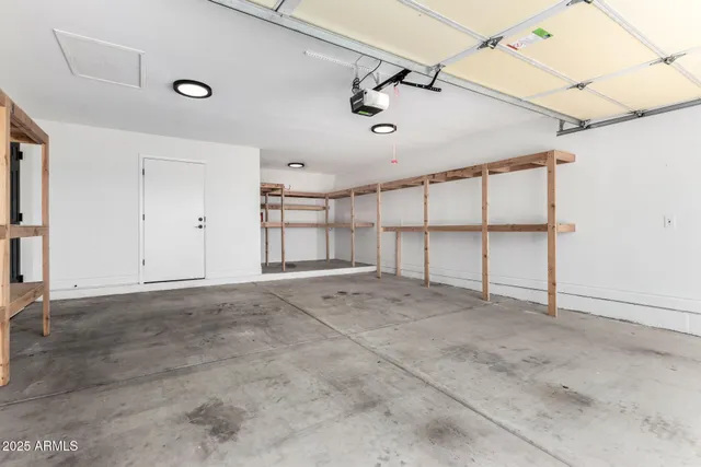 a view of a livingroom with a furniture and natural light