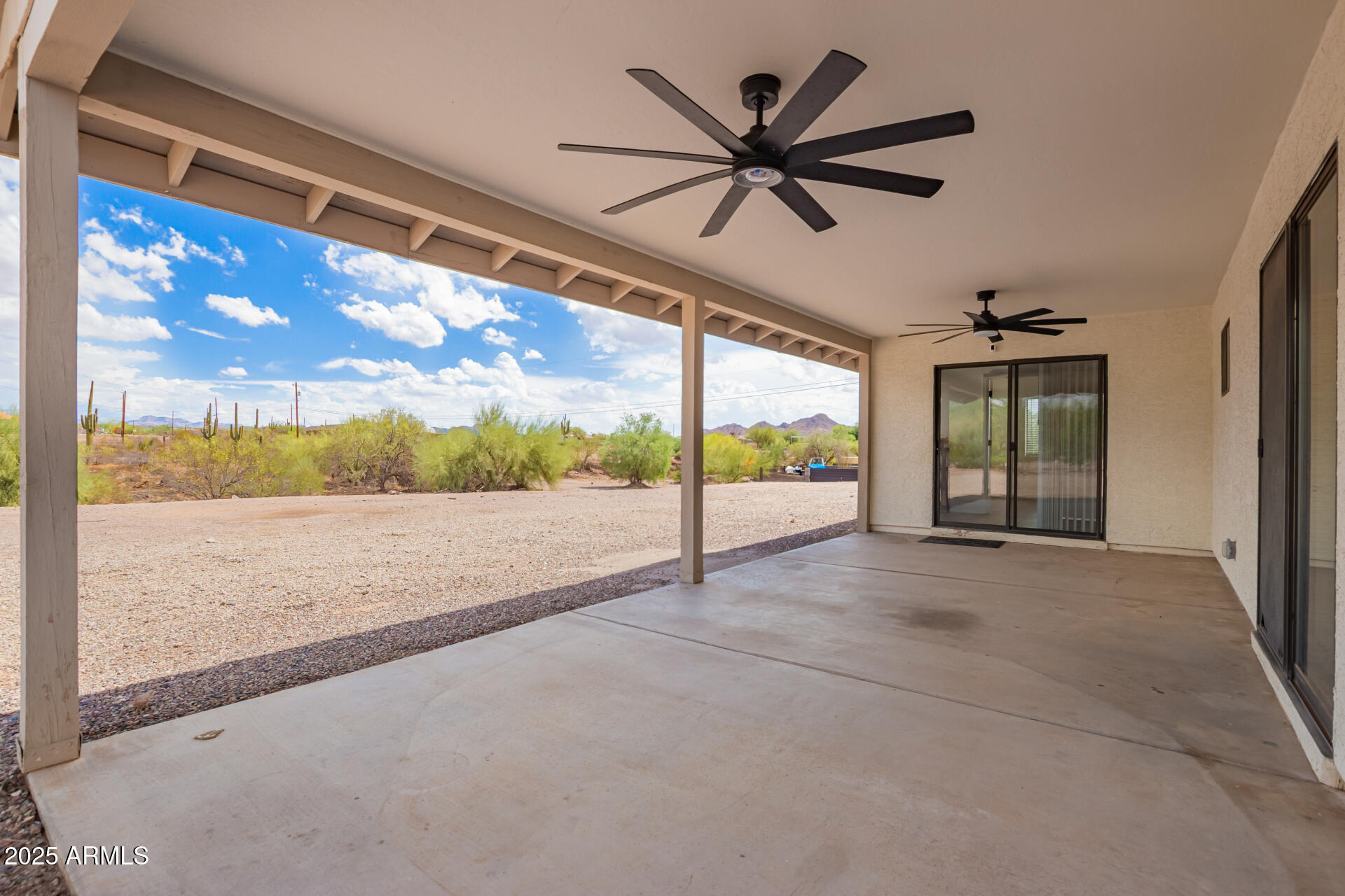 1737 South Mountain View Road Apache Junction, AZ 85119 - Photo 18 of 25 a view of an empty room with a window