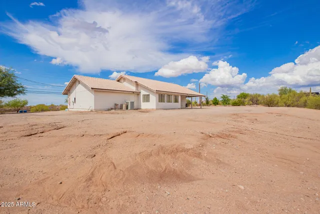 a view of an ocean with beach and in front of it