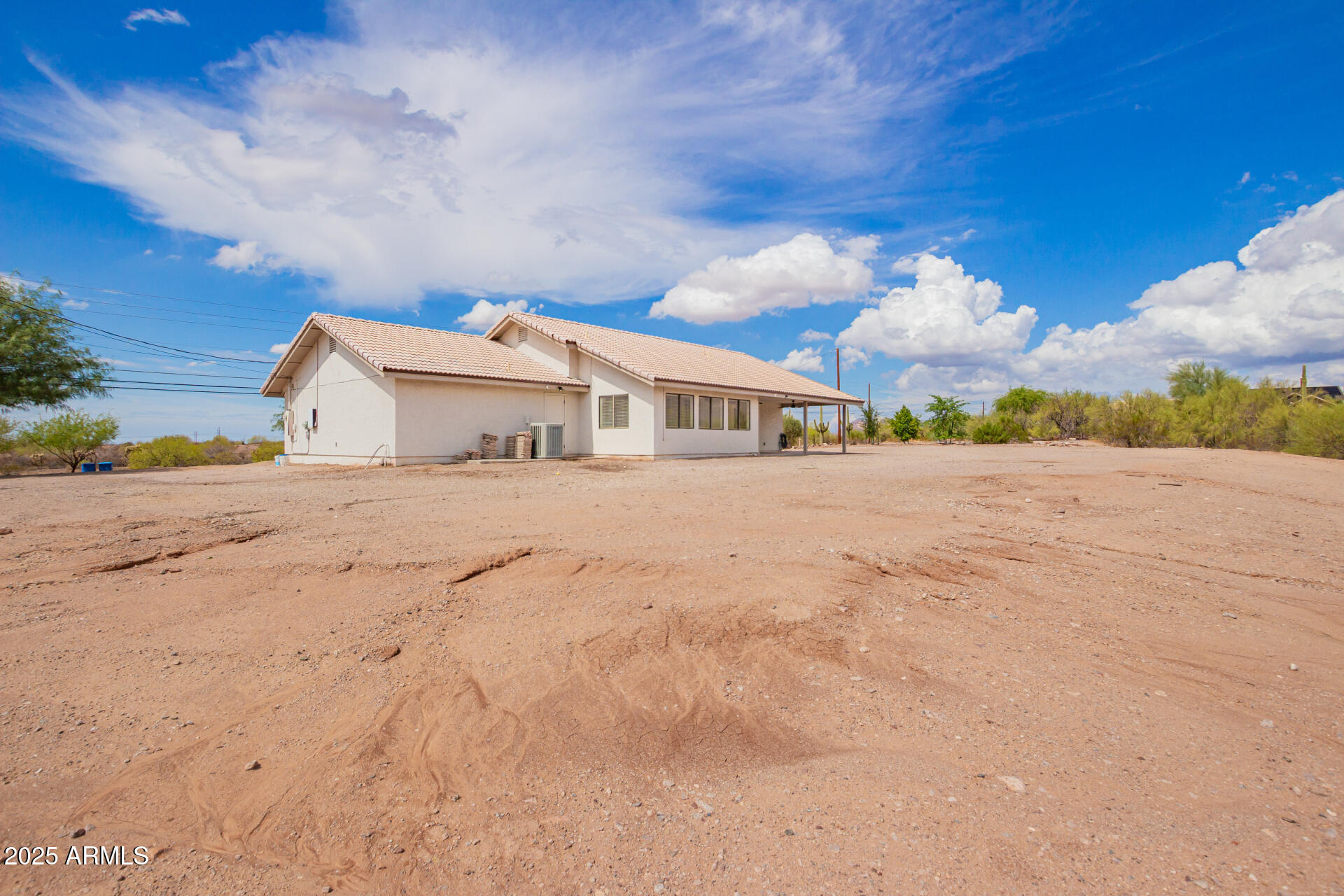 1737 South Mountain View Road Apache Junction, AZ 85119 - Photo 22 of 25 a view of an ocean with beach and in front of it