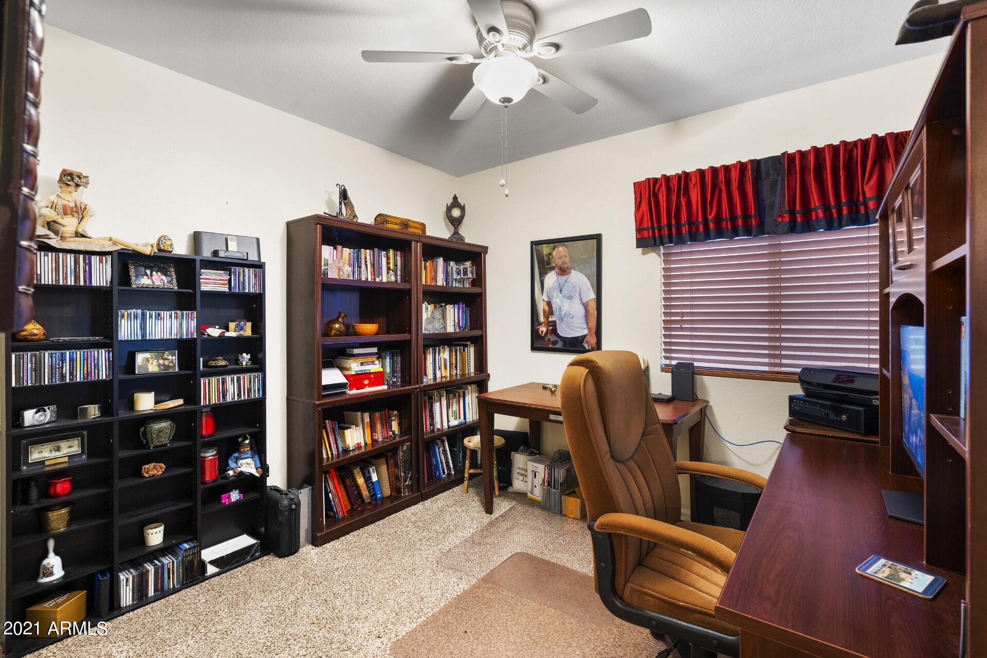 4161 West Bloomfield Road Phoenix, AZ 85029 - Photo 23 of 36 a dining room with furniture and wooden floor