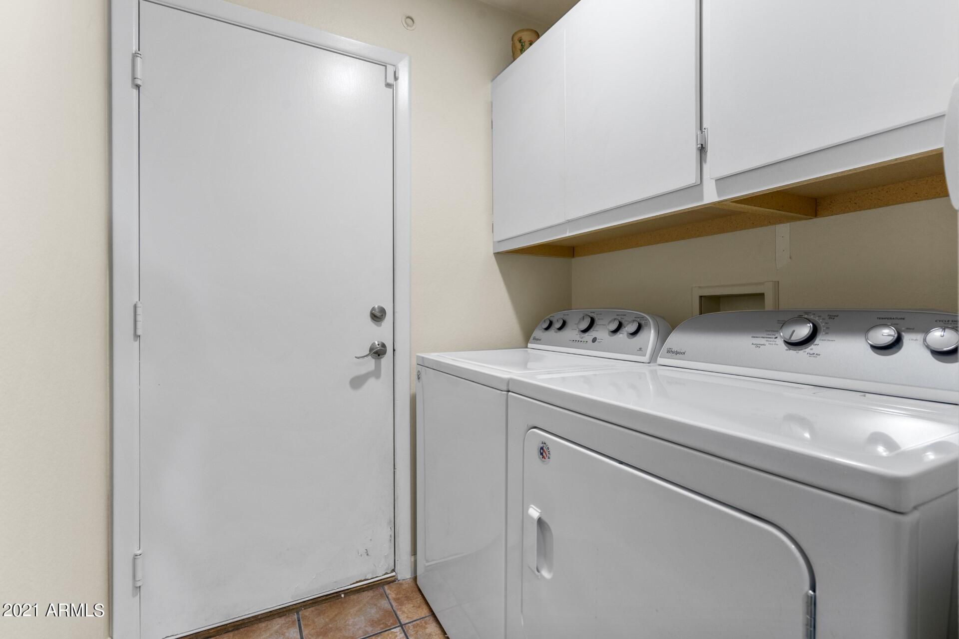 4161 West Bloomfield Road Phoenix, AZ 85029 - Photo 26 of 36 a close up view of washer and dryer