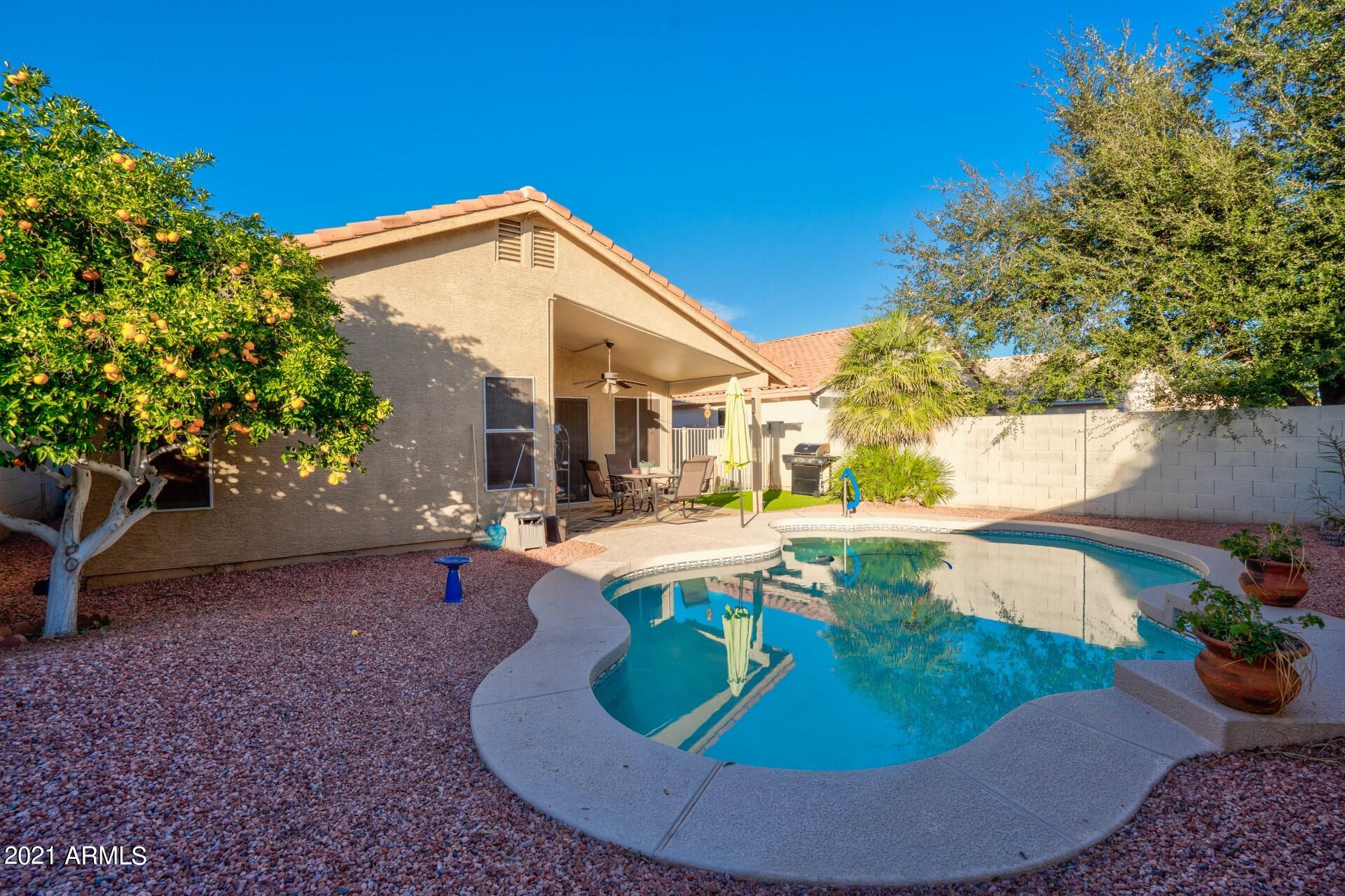 4161 West Bloomfield Road Phoenix, AZ 85029 - Photo 30 of 36 a view of a house with backyard and sitting area