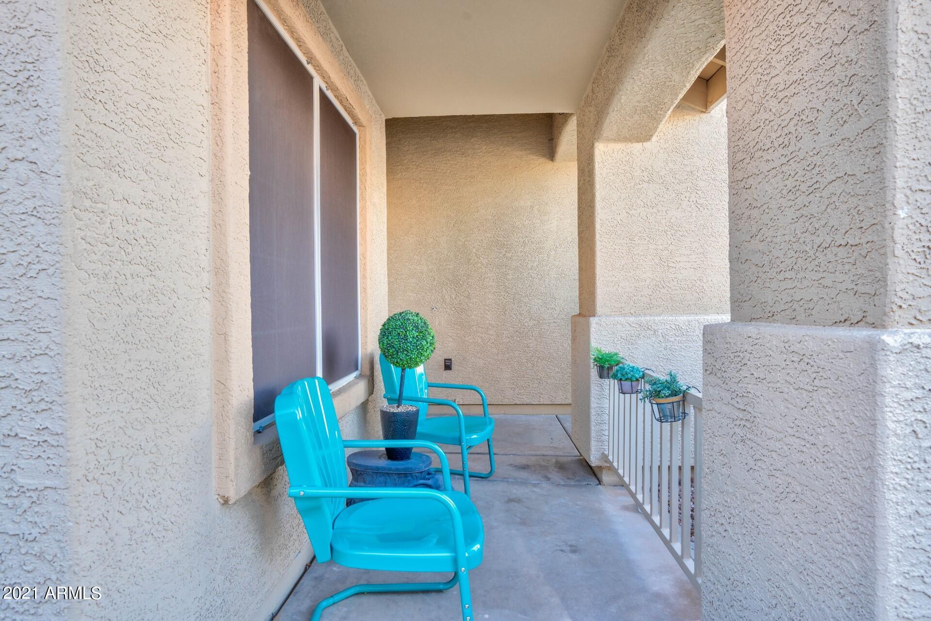 4161 West Bloomfield Road Phoenix, AZ 85029 - Photo 3 of 36 a view of porch with a table and chairs