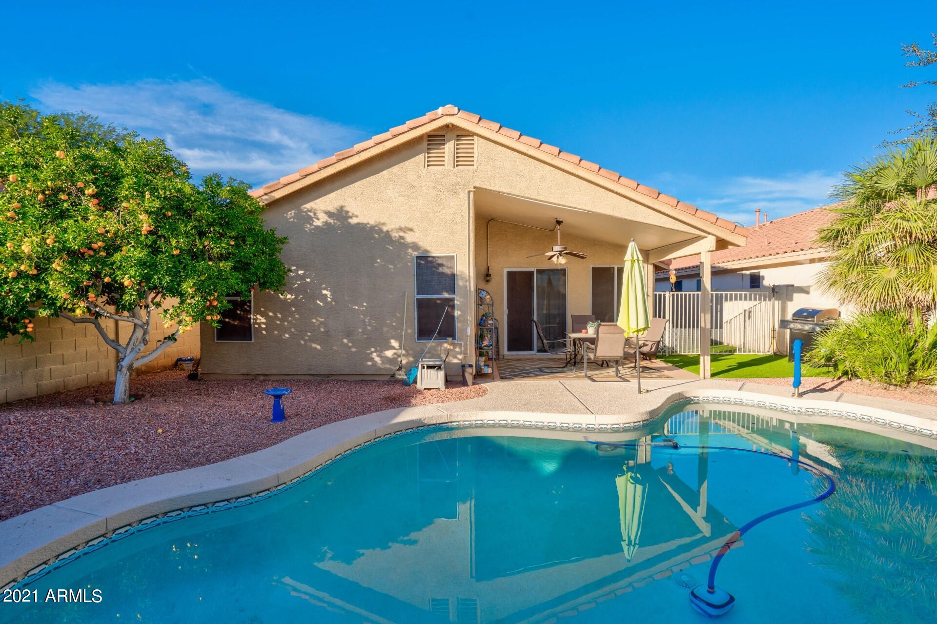 4161 West Bloomfield Road Phoenix, AZ 85029 - Photo 31 of 36 a view of a house with backyard and sitting area