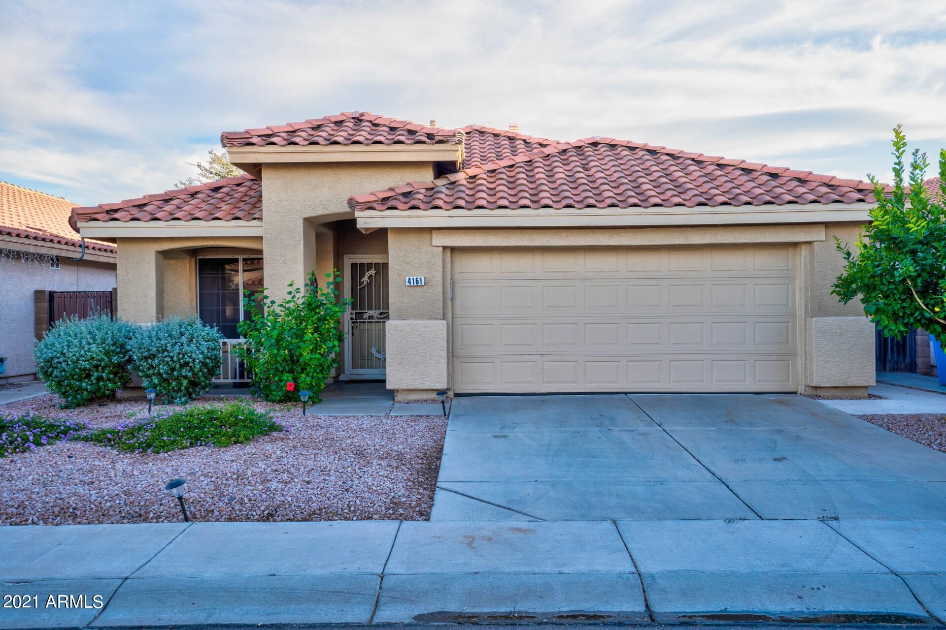 4161 West Bloomfield Road Phoenix, AZ 85029 - Photo 36 of 36 a front view of a house with yard