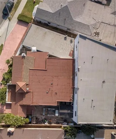 an aerial view of residential house with parking space