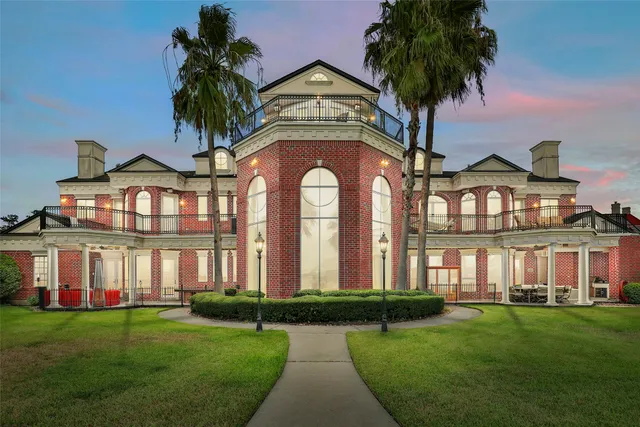 front view of a house with a garden