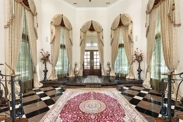 a view of a living room and entry way