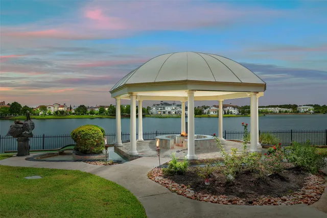 a view of a garden with a patio