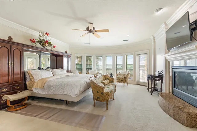 a spacious bathroom with a granite countertop tub sink and mirror