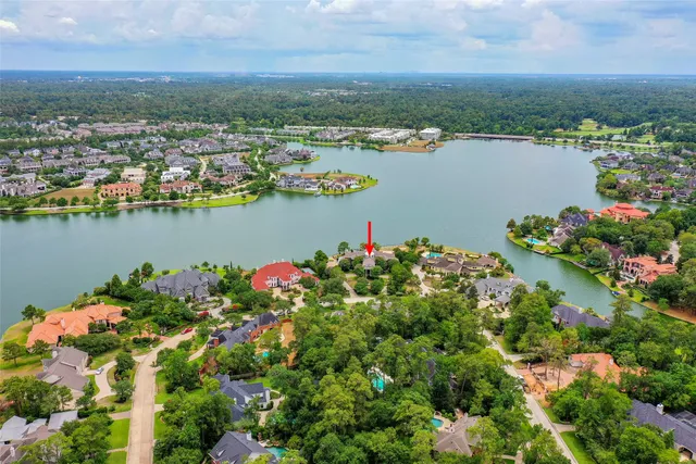 an aerial view of city and lake view