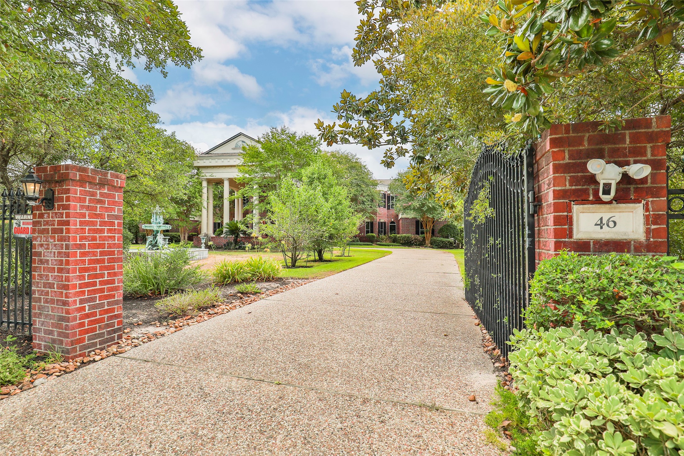 46 South Windsail Place The Woodlands, TX 77381 - Photo 6 of 47 a view of a street with a building in the background