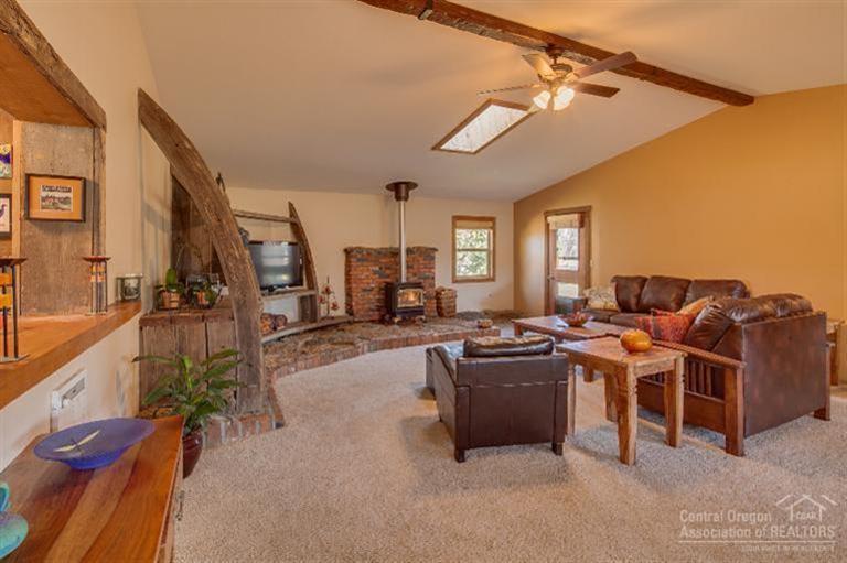 67170 Gist Road Bend, OR 97703 - Photo 9 of 25 Living area has a Vaulted and beamed cei