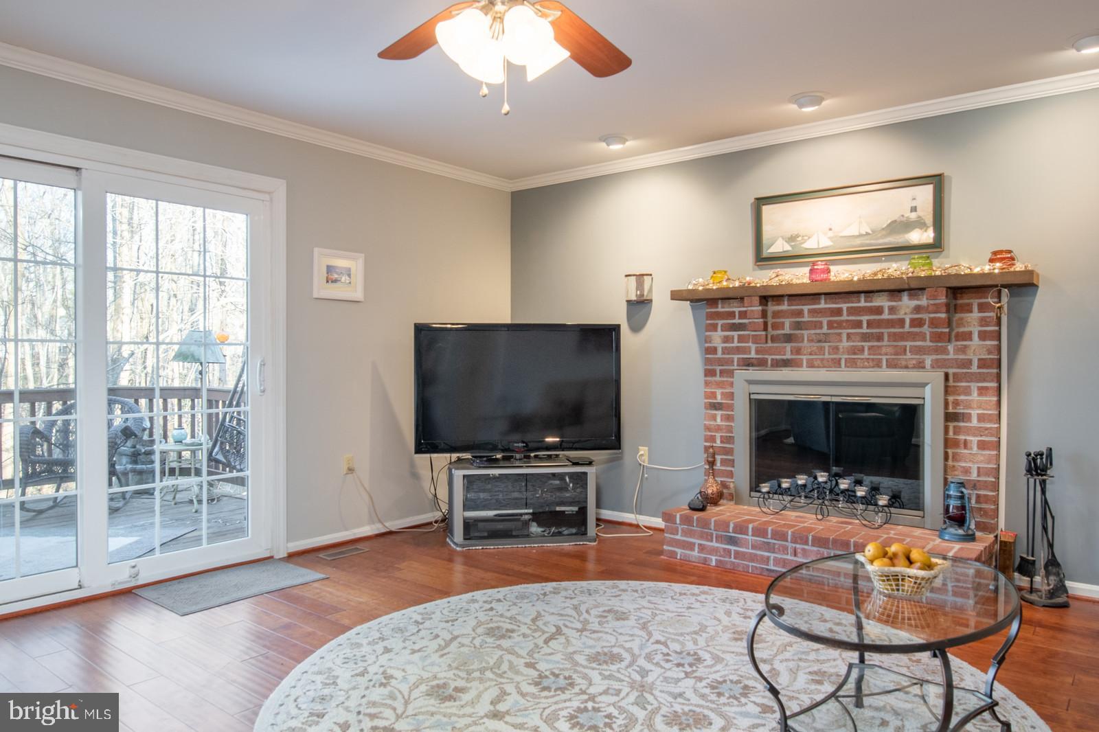 10155 Wavell Road Fairfax, VA 22032 - Photo 7 of 32 Family room with WBFP to get cozy by