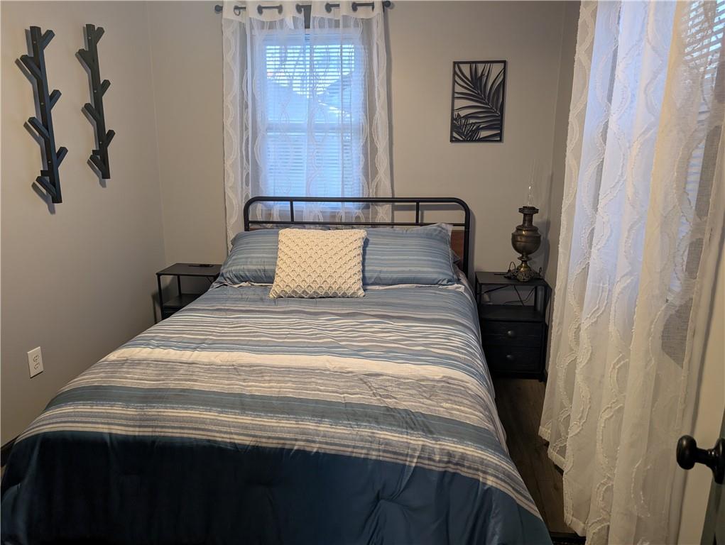7 7th Street Bessemer, PA 16112 - Photo 12 of 24 a bedroom with a bed and cabinets