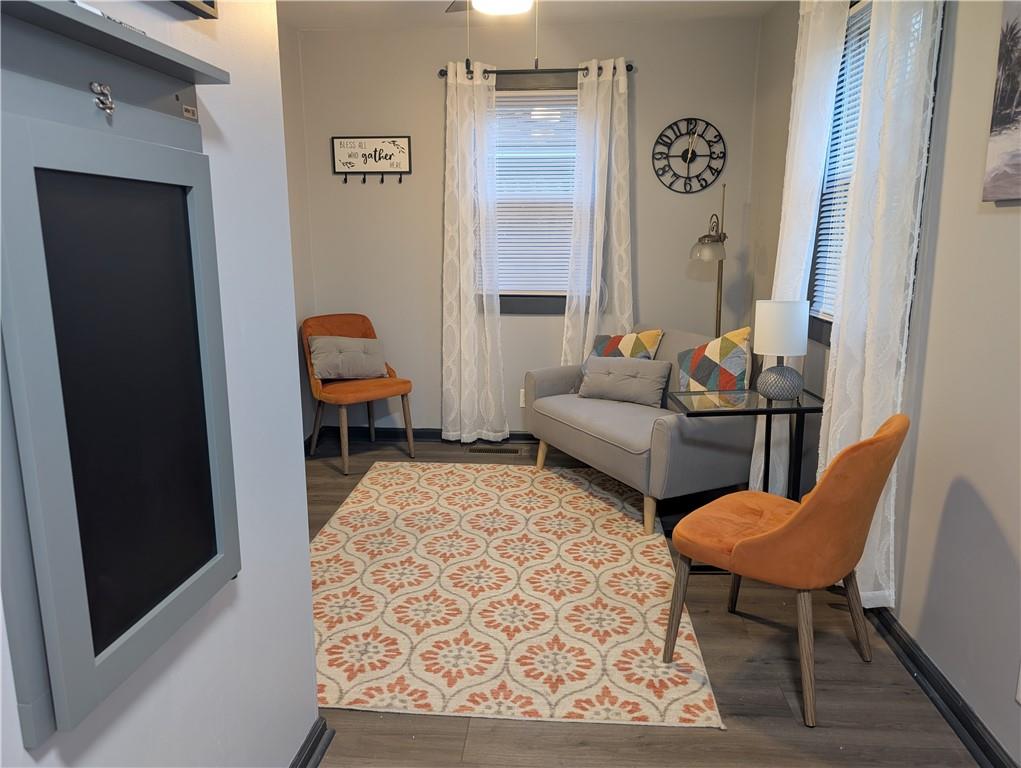 7 7th Street Bessemer, PA 16112 - Photo 7 of 24 a living room with furniture and a rug