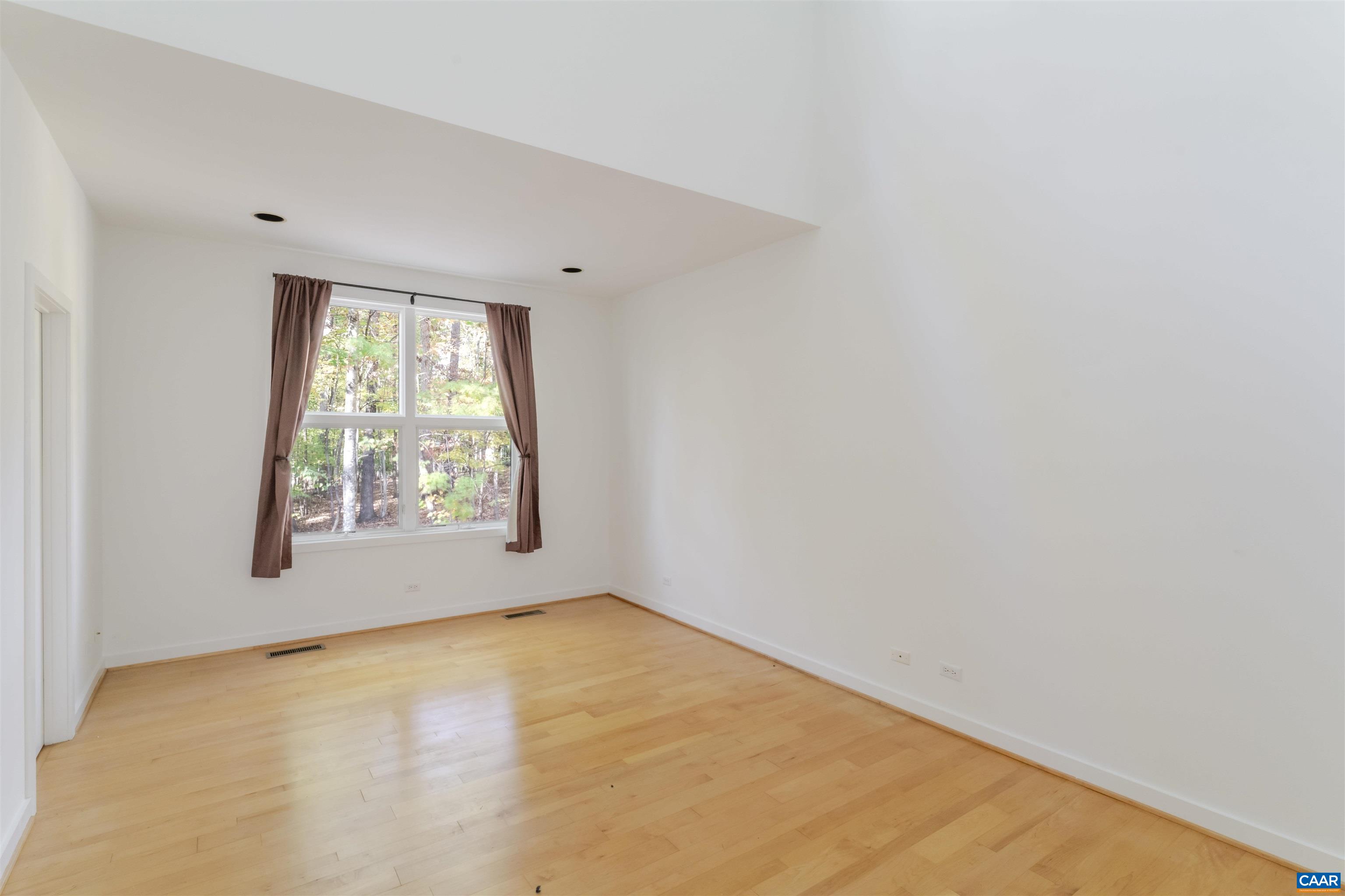 2990 Beau Mont Farm Road Charlottesville, VA 22901 - Photo 19 of 38 an empty room with windows