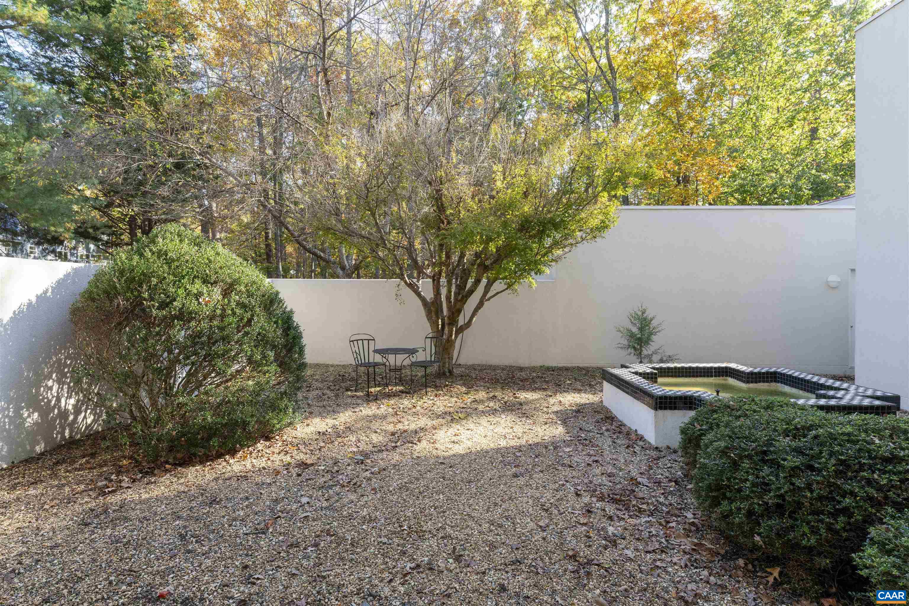 2990 Beau Mont Farm Road Charlottesville, VA 22901 - Photo 32 of 38 a backyard of a house with lots of green space