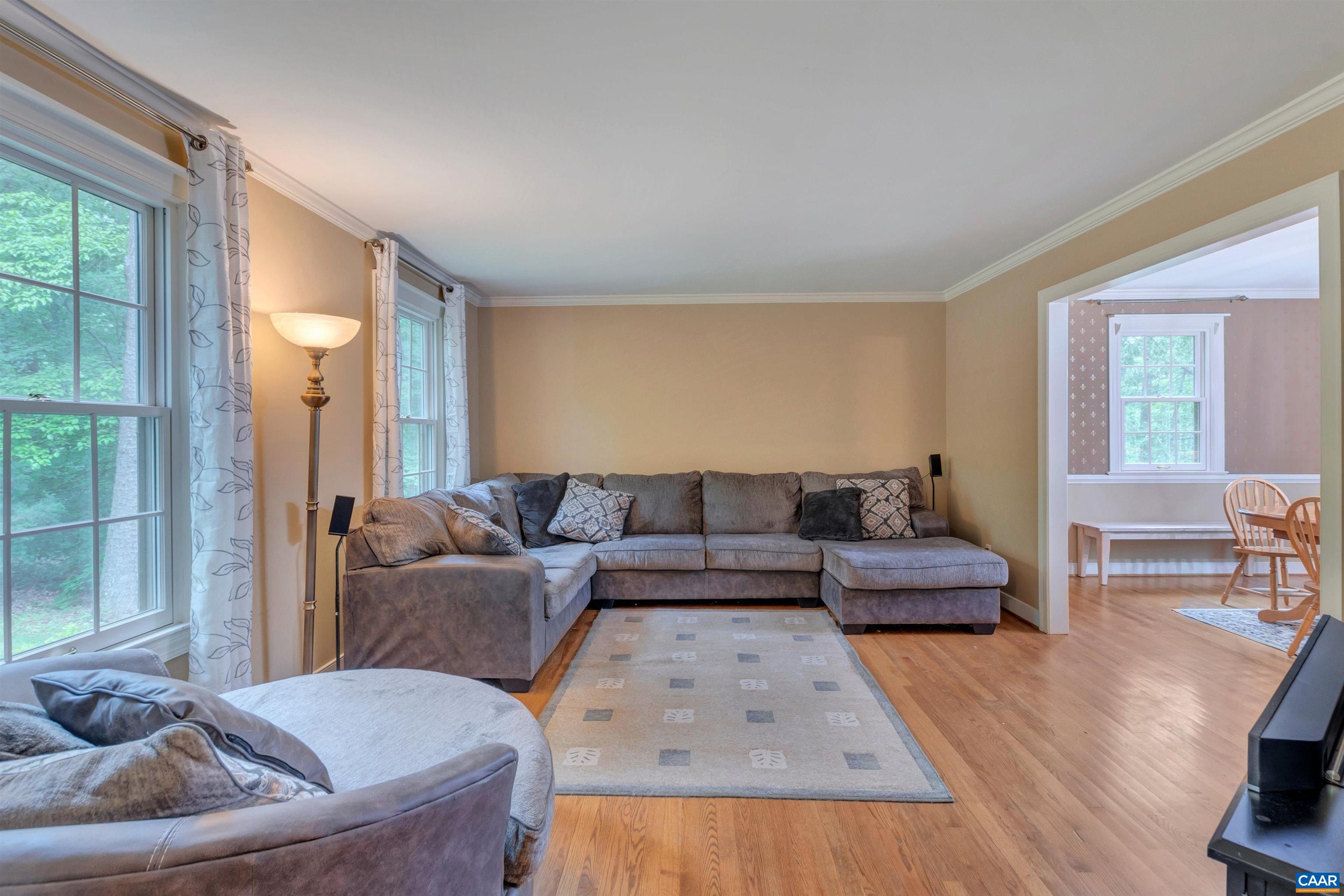 2460 Dunmore Road Charlottesville, VA 22901 - Photo 8 of 41 a living room with furniture and a couch
