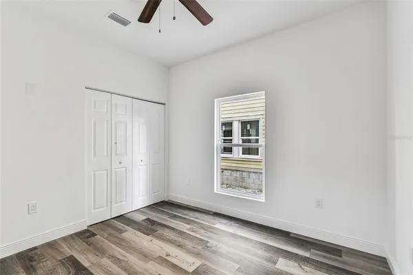 a bathroom with a sink toilet and vanity