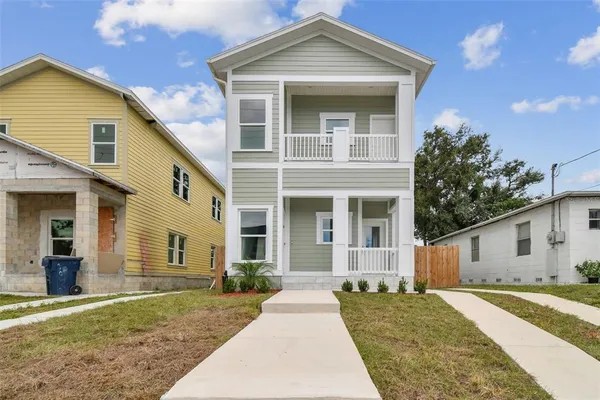 front view of a house with a yard