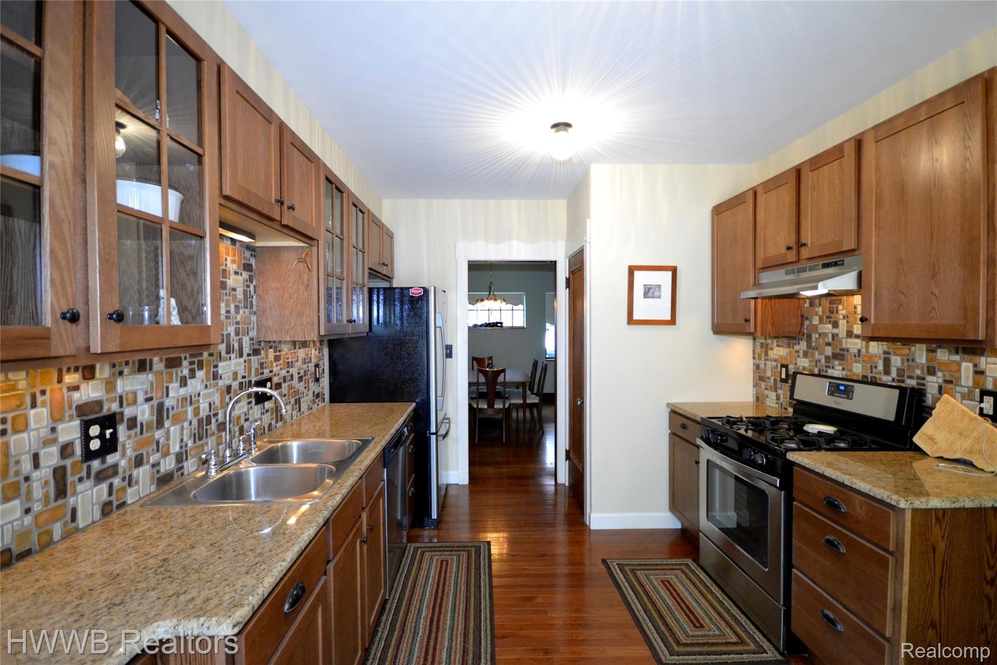 20405 Lichfield Road Detroit, MI 48221 - Photo 12 of 29 Kitchen into Dining