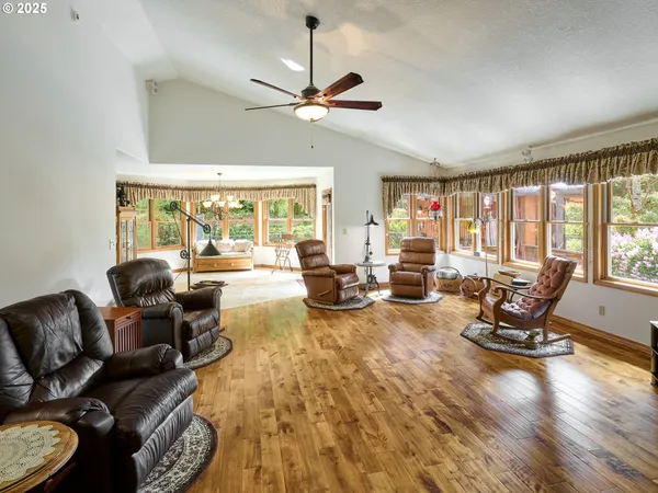 a bedroom with furniture and windows