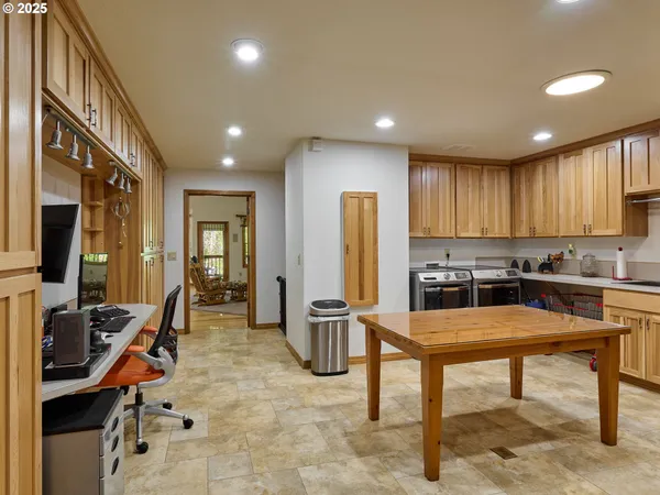 a kitchen with stainless steel appliances granite countertop a stove and a sink