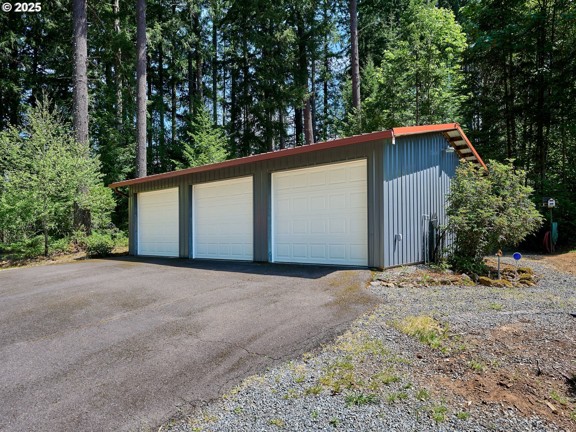 23456 South Schieffer Road Colton, OR 97017 - Photo 9 of 48 a backyard of a house with large trees