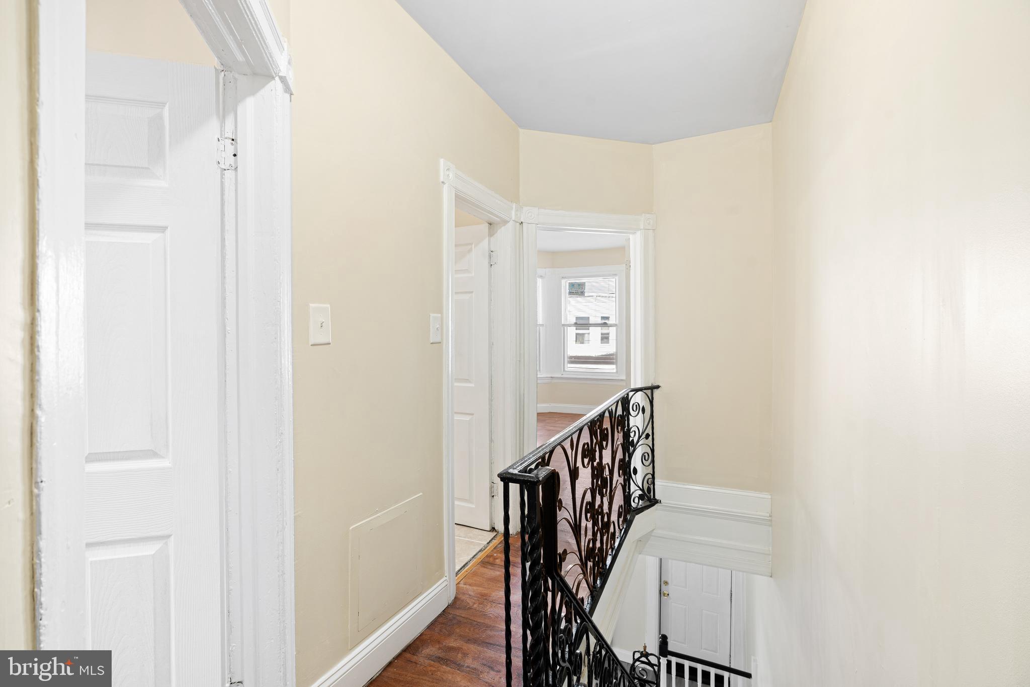 5538 Addison Street Philadelphia, PA 19143 - Photo 6 of 15 a view of a hallway with wooden floor and entryway