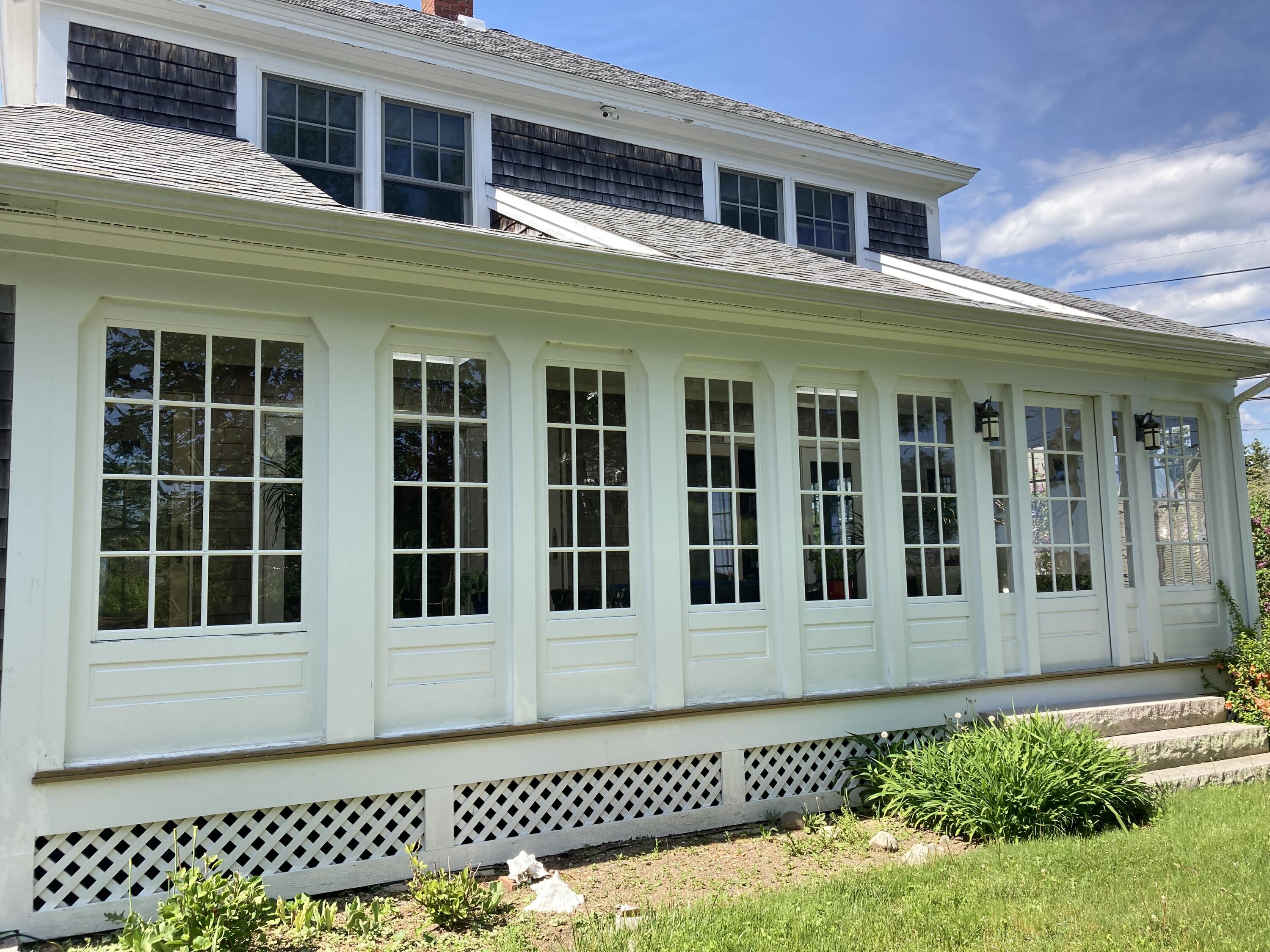 635 Corea Road Corea, ME 04624 - Photo 29 of 35 Glassed-in porch on south side.