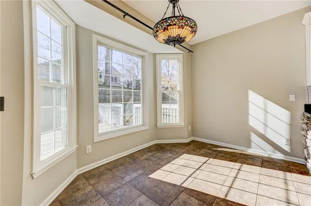 a view of a room that has a window