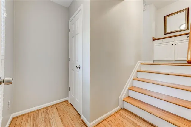 a bathroom with a sink double vanity granite tub and shower