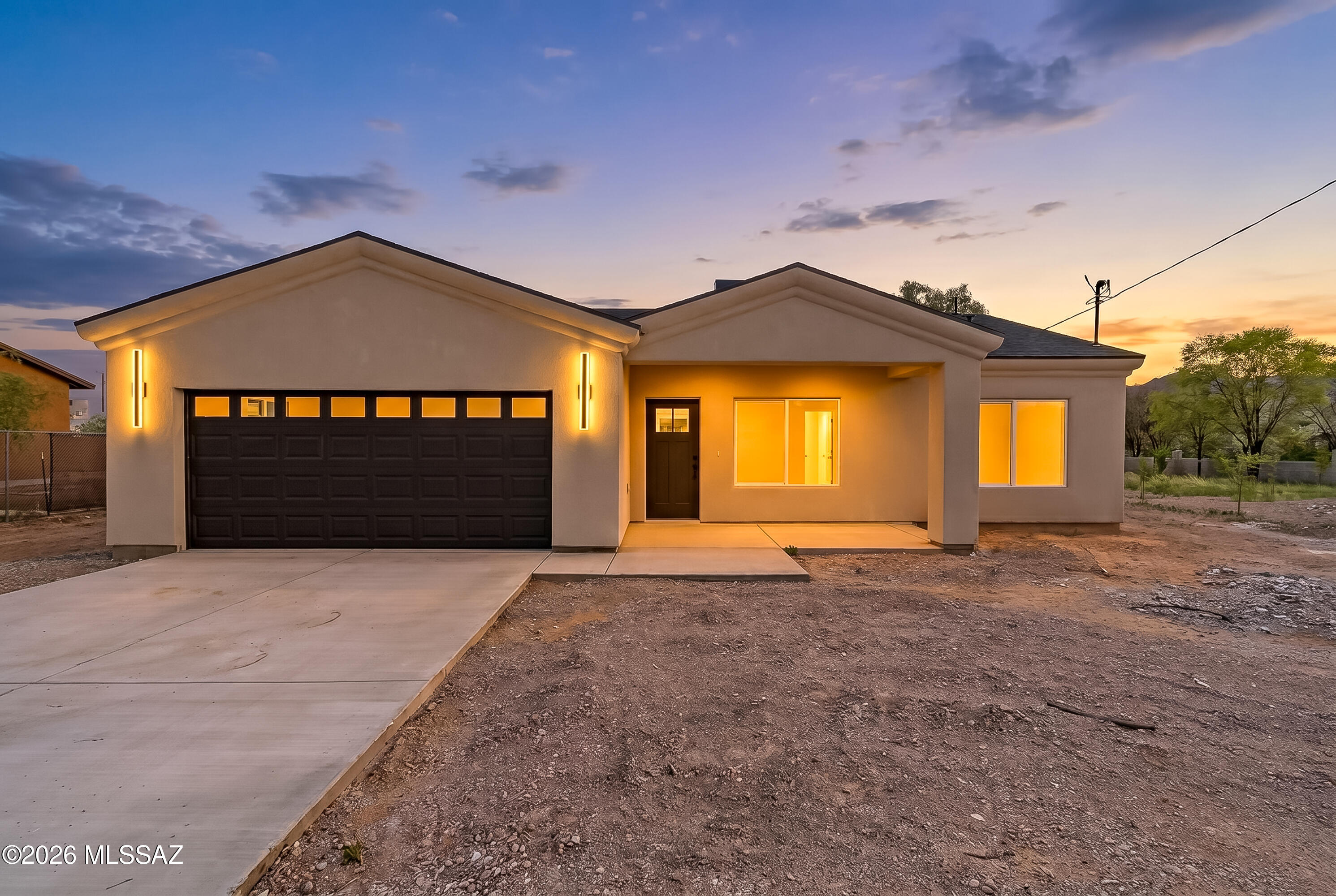 1708 Camino Rivera Rio Rico, AZ 85648 - Photo 1 of 29 0 Front Sunset-1