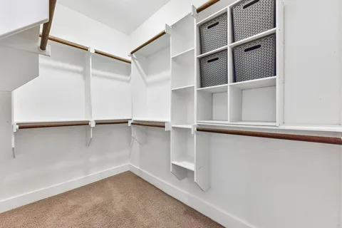 a view of an empty walk in closet